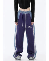 Damen nan weite Jogginghose mit hoher Taille und Jeansstoffeinsätzen sowie Seitenstreifen Drune in Violett 21113