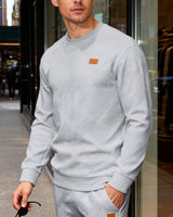 Herren nan strukturierter Baumwollstrickpullover mit Rautenstruktur, Rundhalsausschnitt und elastischen Bündchen Drune in Hellgrau