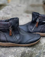 Damen nan lederoptik gefütterte Stiefelette mit seitlichem Reißverschluss und rutschfester Laufsohle Drune in Schwarz