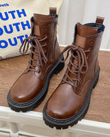 Damen nan knöchelhohe Combat-Boots in Lackoptik mit robuster Profilsohle und seitlichem Reißverschluss Drune in Braun