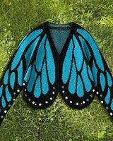 Cardigan Farfallia™ aus strukturiertem Strick mit Schmetterlingsflügel-inspiriertem Design in Blau
