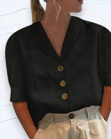 Yvonne | Retro-Chic – Bluse mit Knopfleiste und geknotetem Vorderteil in Schwarz