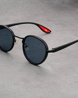 NoirGlow – Luxe Eclipse Rundsonnenbrille in Red Rum