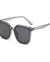 Mila | Modische Oversize-Sonnenbrille für Damen in Grau