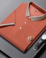 Angan – Elegantes Zweifarbiges Polohemd in Oranje