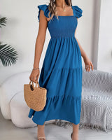Yessa - Elegantes Stufen-Kleid in Blau