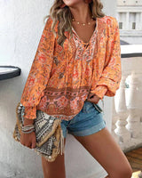 Anika | Stilvolle Blumenbluse in Orange