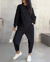 Eva™ Set mit asymmetrisch geschnittenem Sweatshirt und Jogginghose mit Taschen in Schwarz