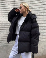 Cristina - Daunenjacke und Daunenweste in Schwarz