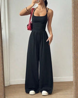 Bela™ Langer Jumpsuit mit weitem Bein, Doppelträgern und offenem Rücken in Schwarz