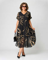 Franziska™ Kleid mit Volant und Gold-Print in Schwarz mit Goldenen Mustern