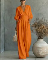 Granada™-Jumpsuit mit Taillengürtel und modernem Design in Orange