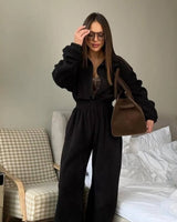 Vancouver™ Sweat-Jumpsuit mit Stehkragen und definierter Taille in Schwarz