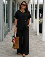 Savena™ Set aus Baumwollleinen mit asymmetrischer Bluse und fließender Palazzohose in Schwarz