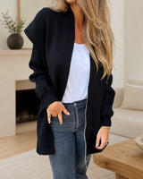 Strickjacke Fenja™ mit Kapuze, weichem Strick und langem Schnitt in Schwarz