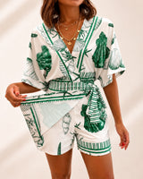 Azzurine™ Skort-Jumpsuit Mit Wickeloptik, Seitlicher Bindung Und Exklusivem Mediterranem Print in Grün