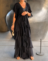 Riza - Elegant geschnittenes Plisseekleid in Schwarz