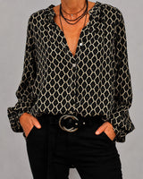 Zara - Locker sitzende Bluse mit V-Ausschnitt in Schwarz