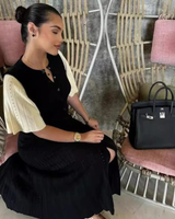 Adelina | Damen Strickkleid mit Maxi Länge, Knöpfen und Rippen Optik in Schwarz