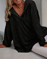 Jessia – Langärmliges Kapuzenshirt in Schwarz