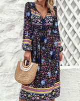 Saskia - Bequemes Kleid mit Blumenmuster und langen Ärmeln in Marineblau