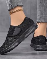 Sabyne – Sneaker Mit Blumenmuster Aus Spitze Und Klettverschluss in Schwarz