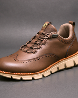 Heijnen – Sneaker Aus Leder im Wingtip Brogue Stil in Braun