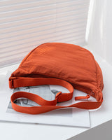 Damen-Umhängetasche aus Nylon in Halbmondform mit verstellbarem Riemen – Vianne in Orange