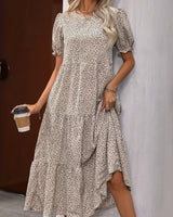 Adelina | Kleid mit puffärmel und Stufen in Beige