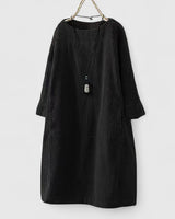 Damen Geripptes Rundhals-Midikleid mit Dreiviertelärmeln und Fronttaschen in Schwarz