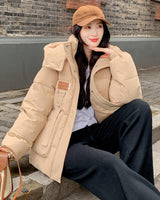 Damen Gesteppte Pufferjacke mit Kapuze Frontreißverschluss Brusttasche und Seitentaschen in Khaki