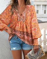 Damen Hemd mit Blumenmuster und V-Ausschnitt in Orange