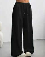 Damen Hose mit elastischem Bund und weitem Bein in Schwarz