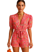 Damen Kurz-Jumpsuit mit Blumenmuster, V-Ausschnitt und Taillengürtel in Rosa