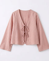 Damen-Kurzbluse mit V-Ausschnitt und Bindebändern in Rosa