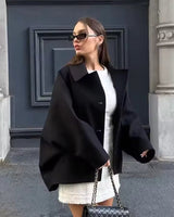 Damen Kurze Jacke mit Knopfverschluss und Umlegekragen in Schwarz
