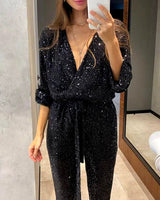 Damen Langärmliger Pailletten-Jumpsuit mit tiefem V-Ausschnitt und Bindegürtel in Schwarz