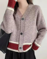Damen Langarm Strickjacke mit V-Ausschnitt und Drei-Knopf-Leiste in melierter Oberfläche in Mauve
