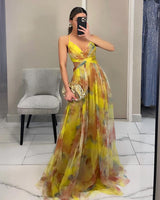 Damen Maxikleid mit Spaghettiträgern, Wickeloberteil und Taillenausschnitt in Gelb