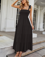 Damen Maxikleid ohne Ärmel mit gesmoktem Oberteil und gestuftem Rock in Schwarz
