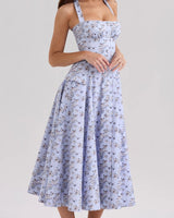 Damen Midi Kleid mit Neckholder Trägern Schleifenbindung A Linien Rock und Blumenmuster in Blau