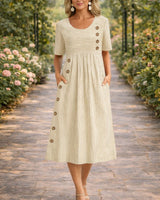 Damen Midikleid mit Rundhalsausschnitt kurzen Ärmeln Streifenmuster und Seitentaschen in Beige