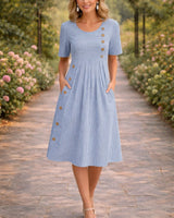 Damen Midikleid mit Rundhalsausschnitt kurzen Ärmeln Streifenmuster und Seitentaschen in Blau