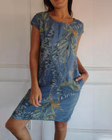 Damen Minikleid mit Rundhalsausschnitt Kurzen Kappenärmeln Seitentaschen und Geradem Saum in Blau