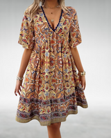 Damen Minikleid mit V-Ausschnitt und Kontrastkante mit Kurzen Ausgestellten Ärmeln im Paisley-Muster in Gelb