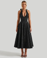 Damen Neckholderkleid mit Korsett Oberteil und Strukturmuster und Schleife am Nacken in Schwarz