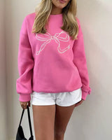 Damen Pullover mit Rundhalsausschnitt langen Ärmeln mit Bündchen und Schleifenstickerei in Rosa