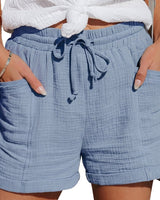 Damen Shorts mit elastischem Bund und Kordelzug sowie aufgesetzten Taschen und umgeschlagenen Säumen in Hellblau