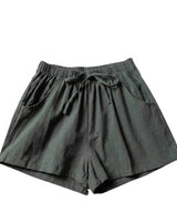 Damen-Shorts mit hohem Bund, Kordelzug und Seitentaschen in Dunkelgrün