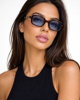 Damen Sonnenbrille mit Rechteckrahmen und abgeschrägten Ecken in Blau